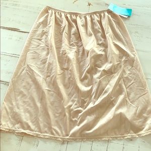 NWT tan skirt slip (s)